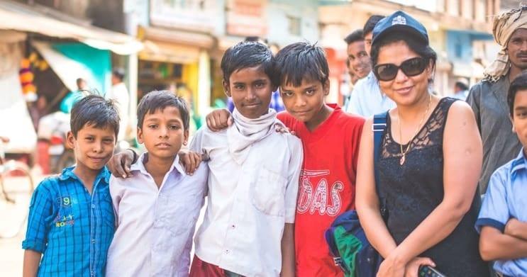 Poonam Gupta of PG Paper with children form India charity