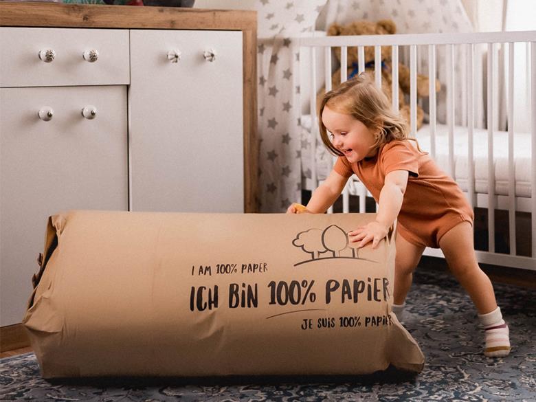 sustainable paper mattress packaging including child