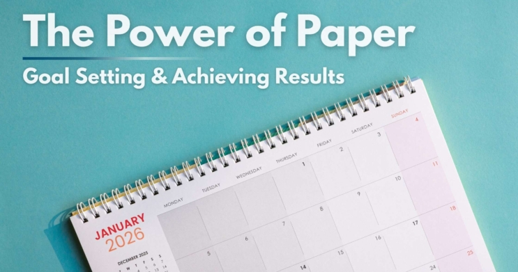 the power of paper fo goal setting and achieving results showing a flat lay of a 2026 paper calendar/planner